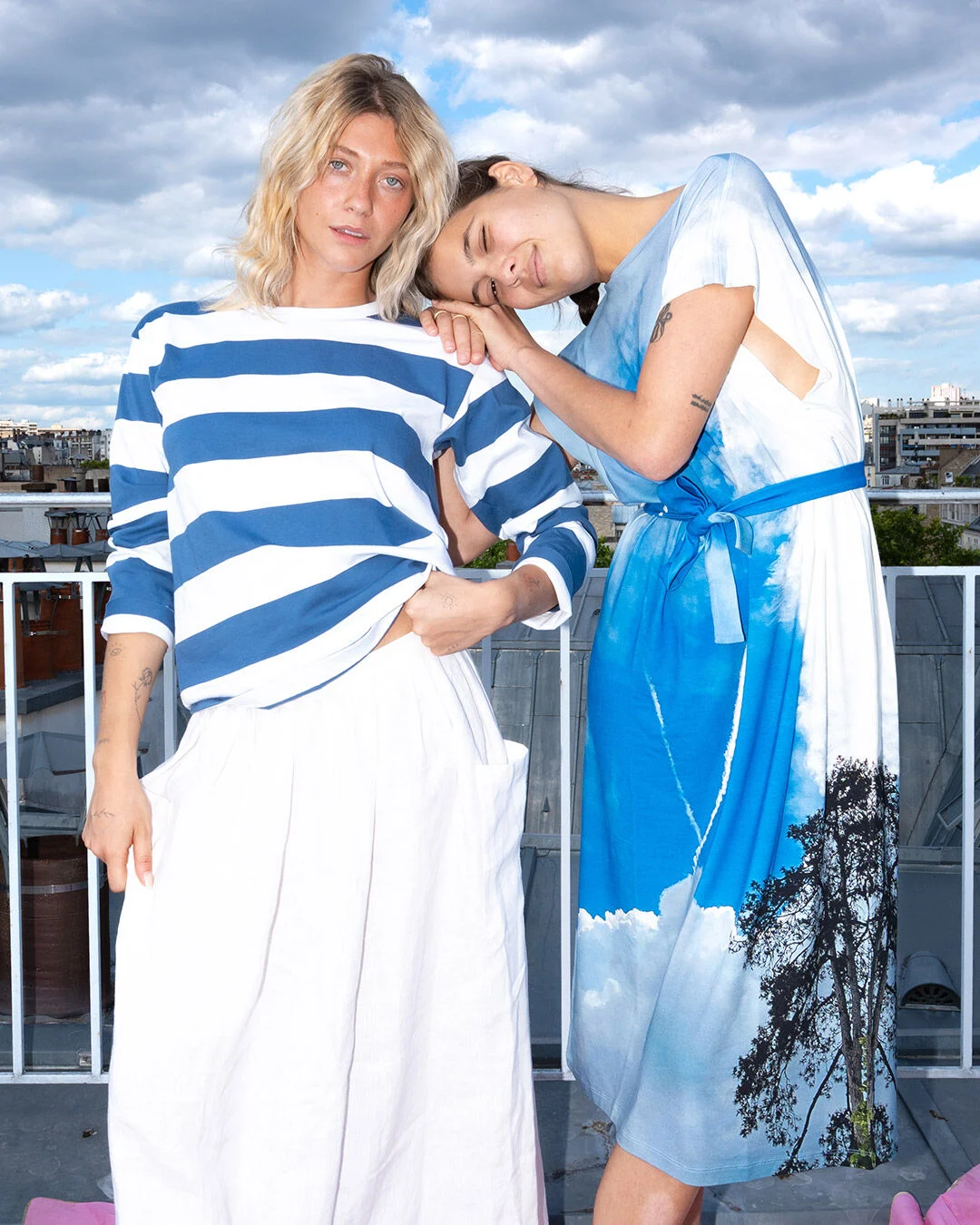 the ‘Cool’ T-shirt with wide white and blue stripes, and the ‘Astana’ dress with digital print.