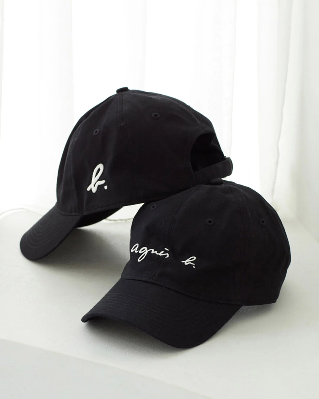 on and off the pitch, the black embroidered agnès b. cap.